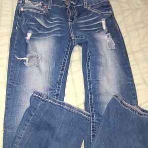 Women's Distressed Blue Jeans